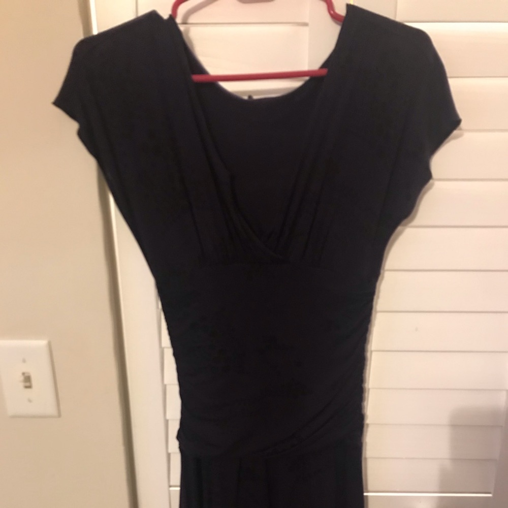 Mid length dark purple with black swirl design